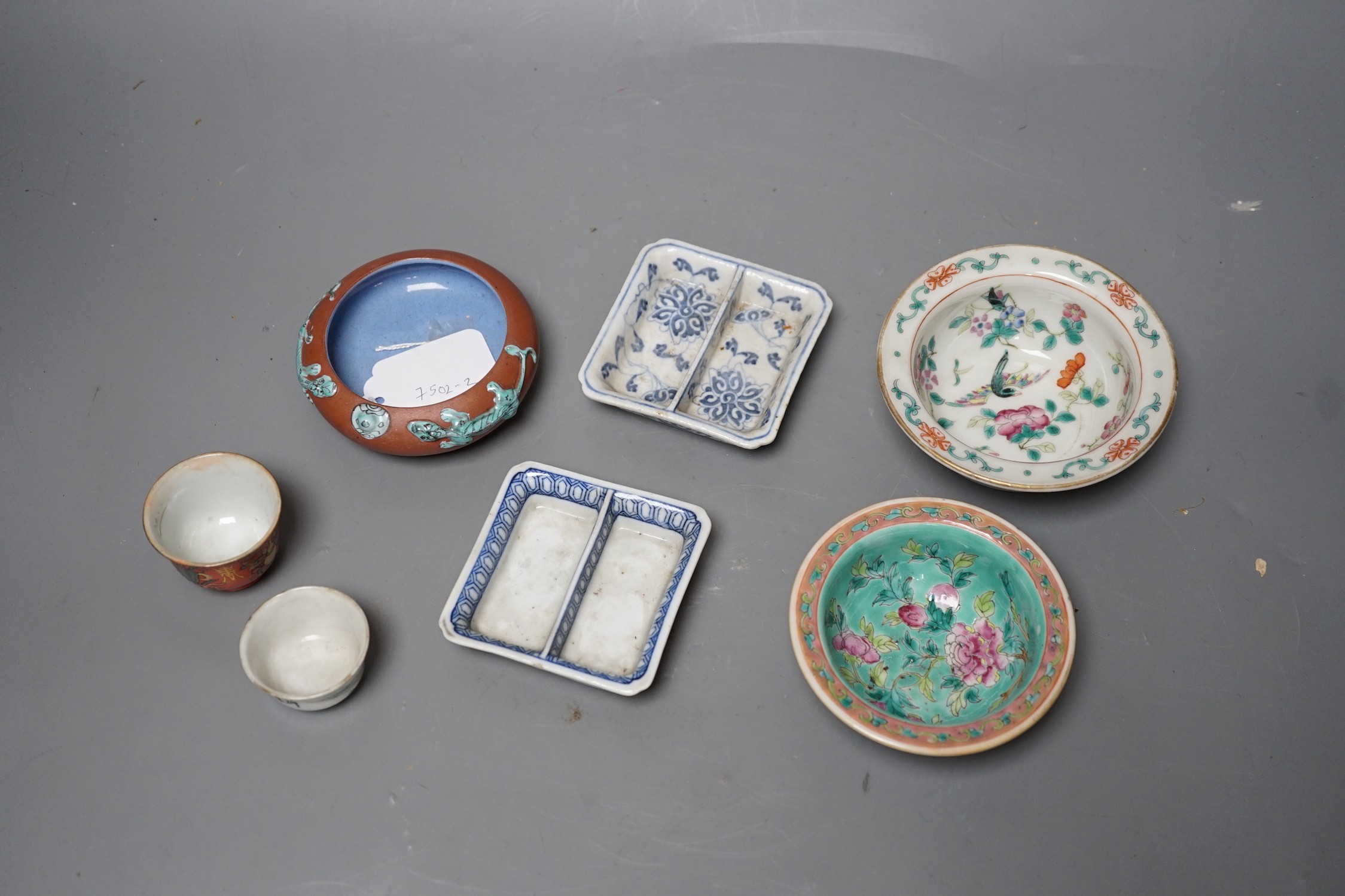 A group of late 19th / early 20th century Chinese ceramics, comprising two Straits small famille rose small bowls, 2 cups to signature dishes and a Yixing enamelled brush-washer, 9.4cm